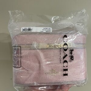 Coach Powder Pink Cosmetic Case.